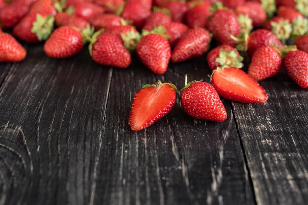 Tasty strawberry on a wooden table 