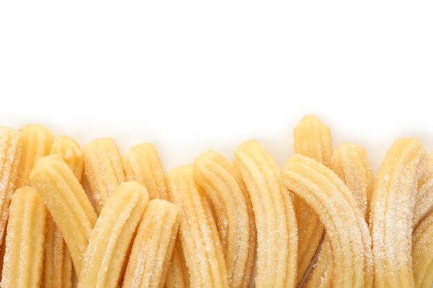 Tasty sweet churros isolated