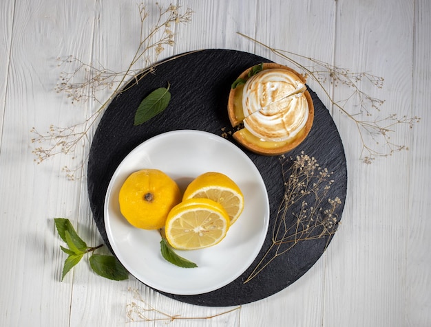 Tasty sweet mini tartlet with lemonDessert phototop view