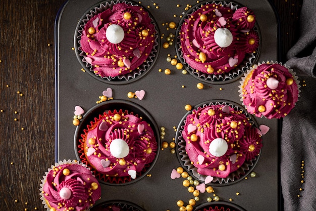 Tasty and sweet red cupcakes made of raspberries