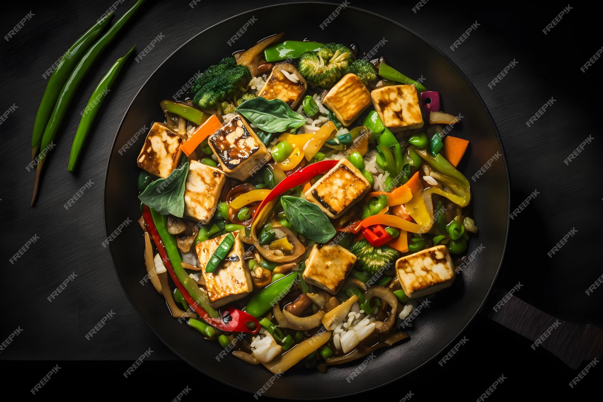 Premium Photo | Tasty tofu stir fry with veggies, crispy tofu and fresh