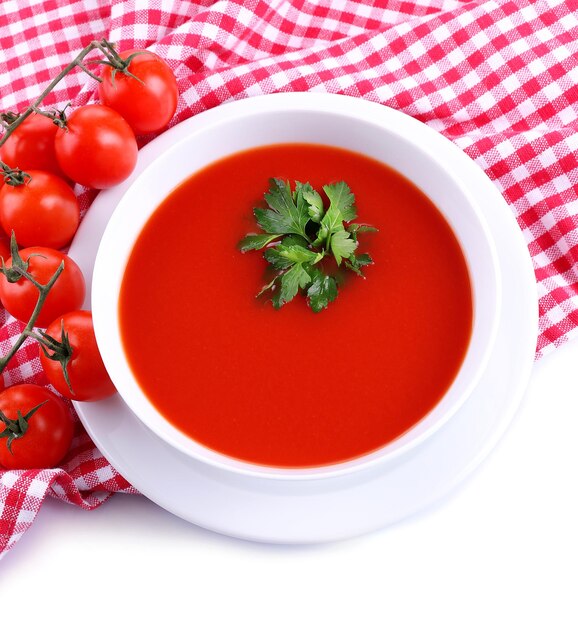 Tasty tomato soup isolated on white