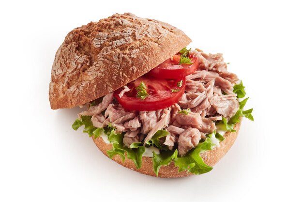 Tasty tuna sandwich on white table