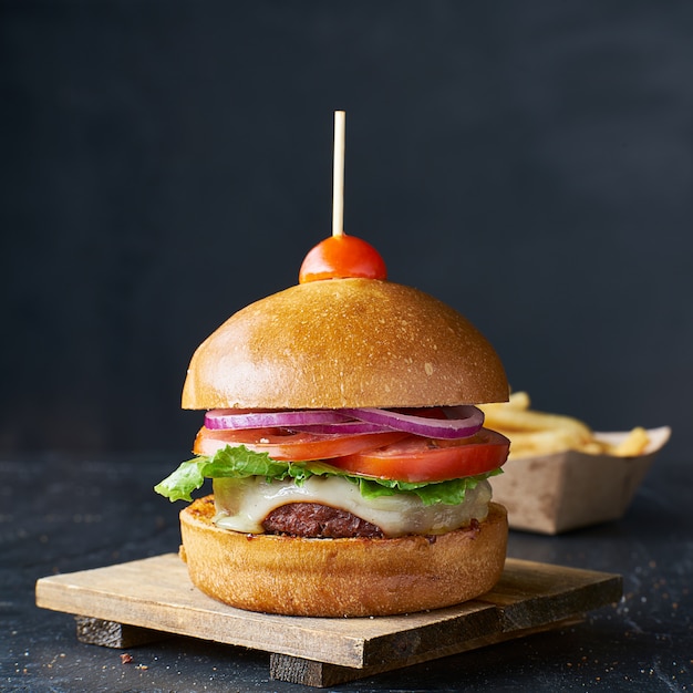 Tasty vegan cheeseburger with meat alternative patty and cheese