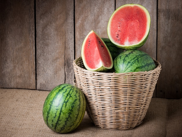 Tasty watermelon on wooden background