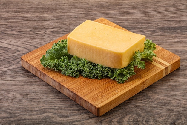 Tasty yelloow Tilsiter cheese brick