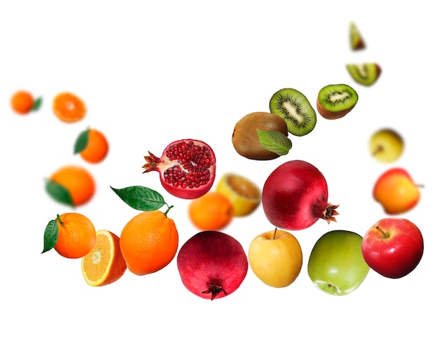 Photo tastyjuicy fresh apple kiwi pomegranate orange levitate on a white background healthy diet fresh fruits and vegetables