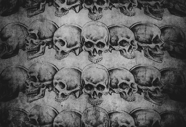 Photo tattoo art, skulls over old paper