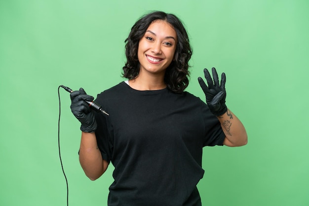 Tattoo artist argentinian woman over isolated background happy and counting four with fingers