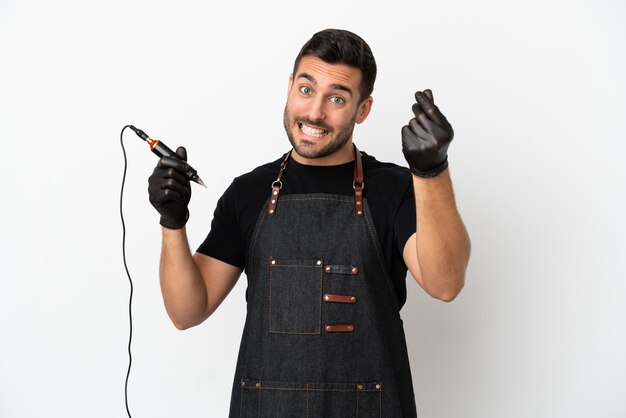 Tattoo artist man isolated on white background making money gesture