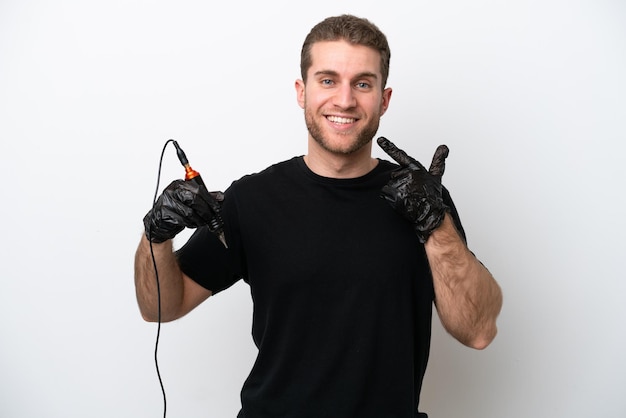 Tattoo caucasian artist man isolated on white background giving a thumbs up gesture