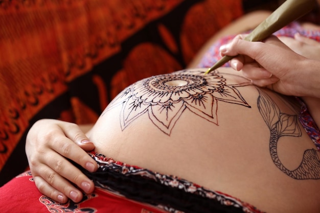 Henna belly button tattoo Stock Photo  Alamy