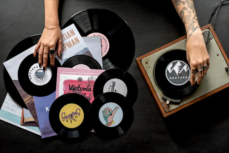 Photo tattoo woman with music vinyl record disc with player