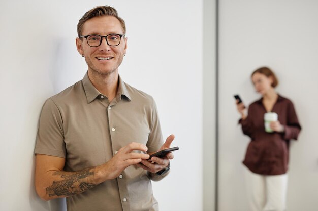 Tattooed Man in Office Minimal