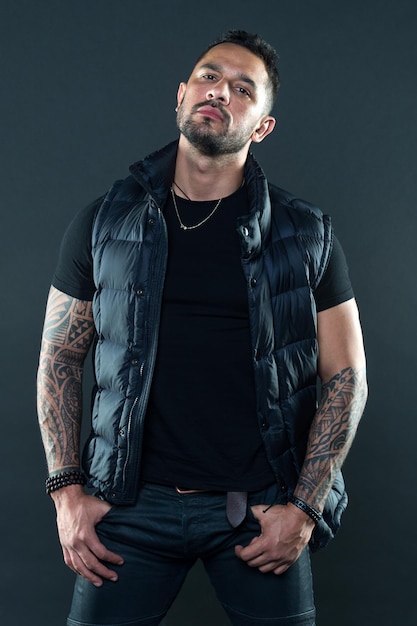 Tattoos great way express masculinity and manliness Bearded man posing with tattoos Masculinity and fashion concept Tattoo brutal attribute Man confident unshaven brutal appearance tattooed arms