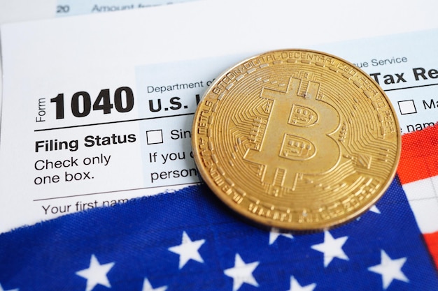 Tax form 1040 us individual income tax return and bitcoin\
business finance digital currency virtual cryptocurrency\
concept