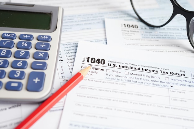 Tax form 1040 US Individual Income Tax Return business finance concept