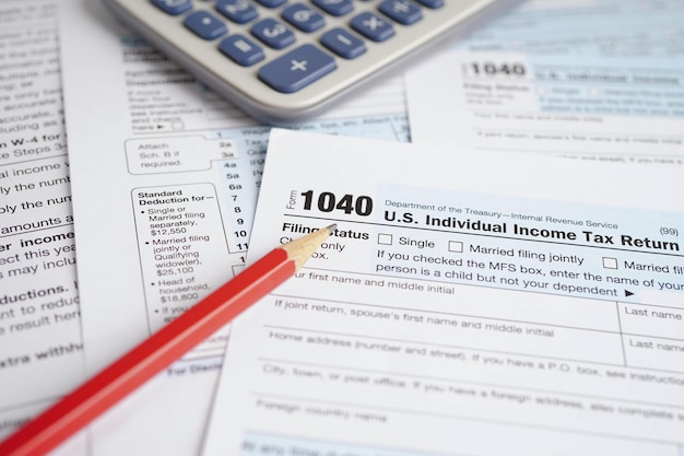 Photo tax form 1040 us individual income tax return business finance concept