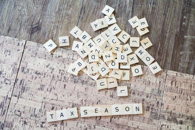 Photo tax season spelled out in letter tiles