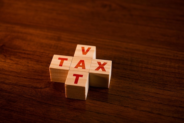 Tax vat on wood block business concept