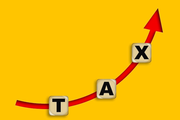 Tax word with up arrow for business concept