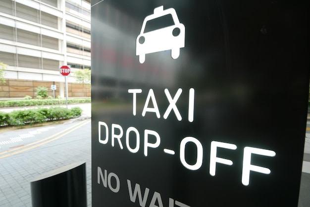 Taxi stand sign on black in singapore