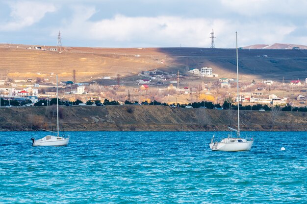 Tbilisi sea and boats with deflated sails