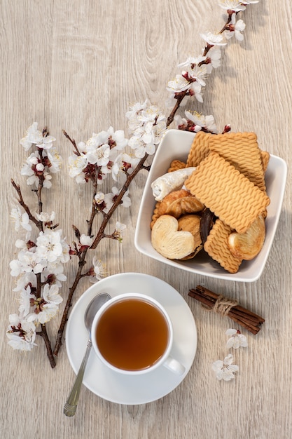 Tea and apricot flowers