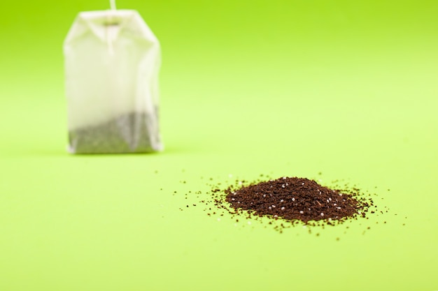 Tea bag on a green background