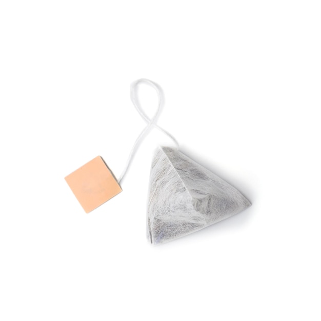 Tea bag on white background top view