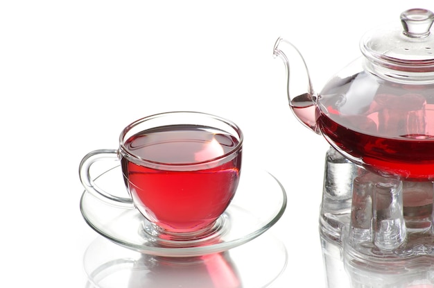 Tea being poured into glass tea cup