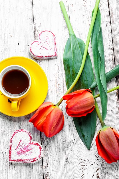 Tea and bunch of tulips