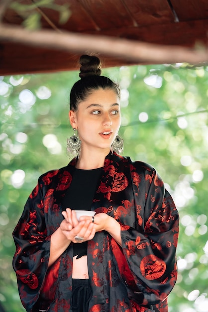 Tea ceremony is performed by tea master in kimono