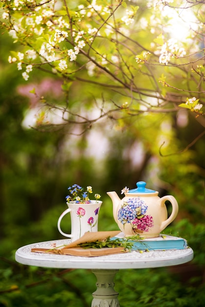 Tea in cherry blossom garden