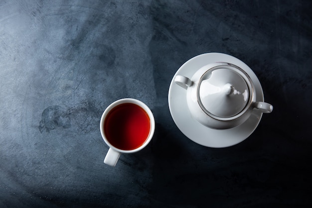 Tea cup and cake on the table