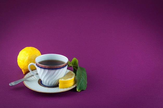 Tea cup on colored background