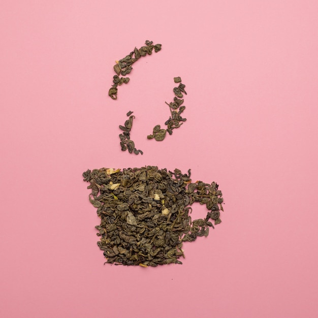 Tea cup icon made of dry Oolong tea leaves