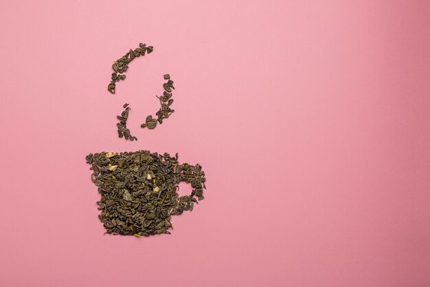 Tea cup icon made of dry Oolong tea leaves