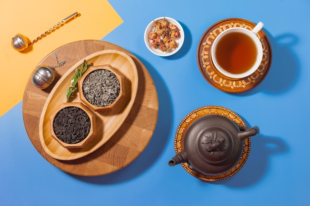 Tea in a cup with dessert on a bright colored background