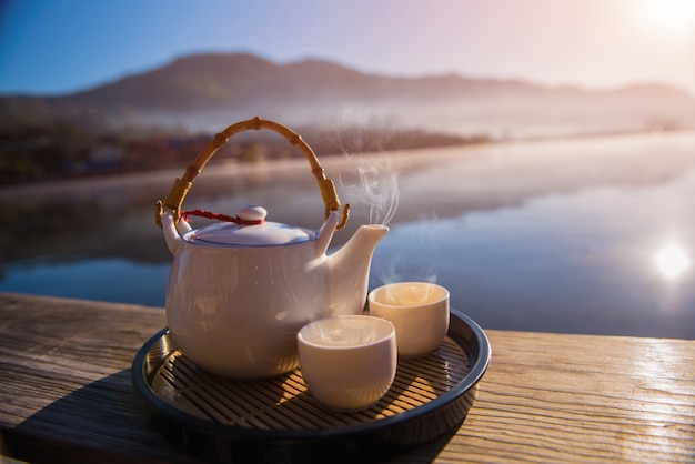 Tea cup on the wooden table.