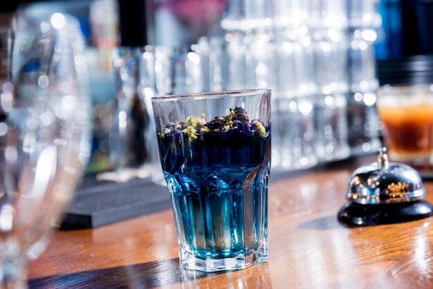 Tea in a glass teapot at bar counter. Restaurant. Nightlife