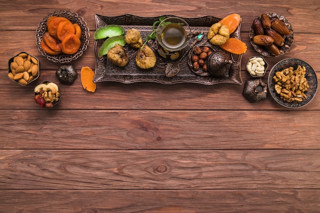 Tea glass with different dried fruits and nuts 