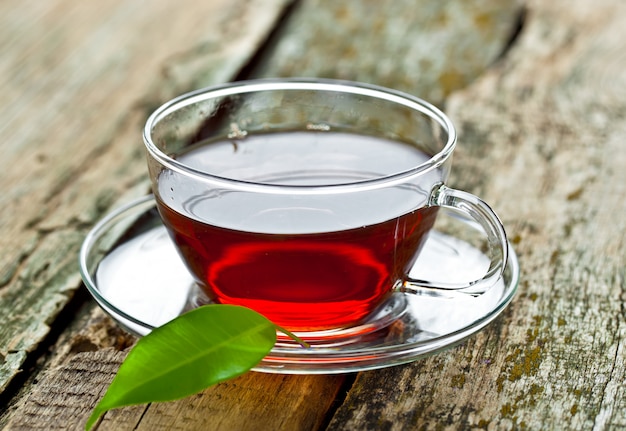 Tea hot drink on old background on the table