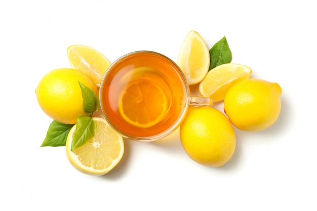 Tea and lemons isolated, top view