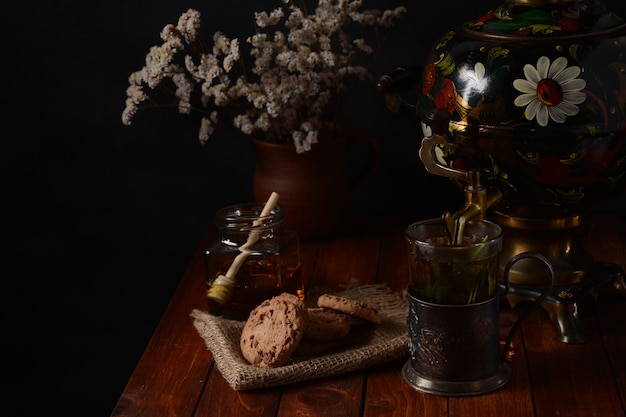 Photo tea party in rustic style with samovar