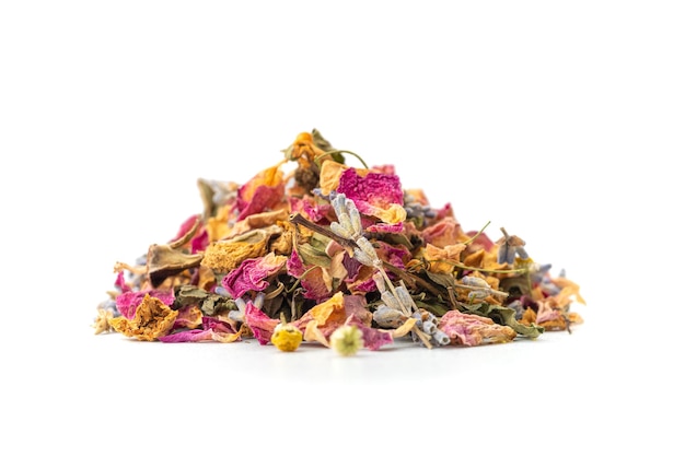 Tea pile of lavender chamomile rose petals mint on white background