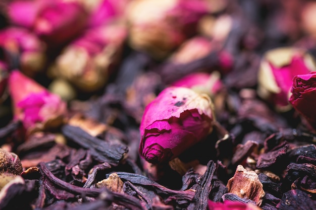 Tea roses and dried hibiscus flower