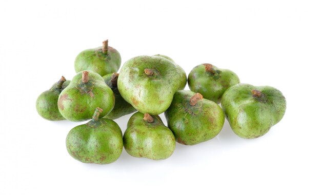 Tea seeds on white background