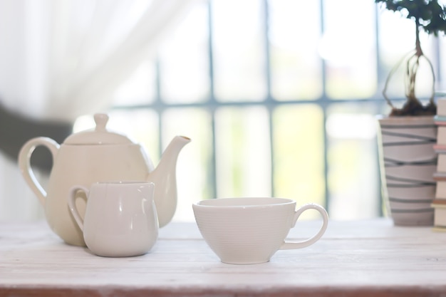 Tea set including a teacup, a teapot and a sugar bowl