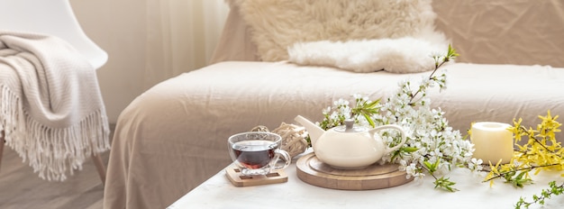 Tea set with flowers on a table